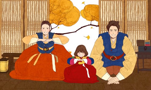 韓国 韓国の伝統衣装を着た家族が窓の前に座っている。