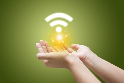 緑の背景に人の手が韓国の雰囲気を感じさせる Wi-Fi のシンボルを持っています。