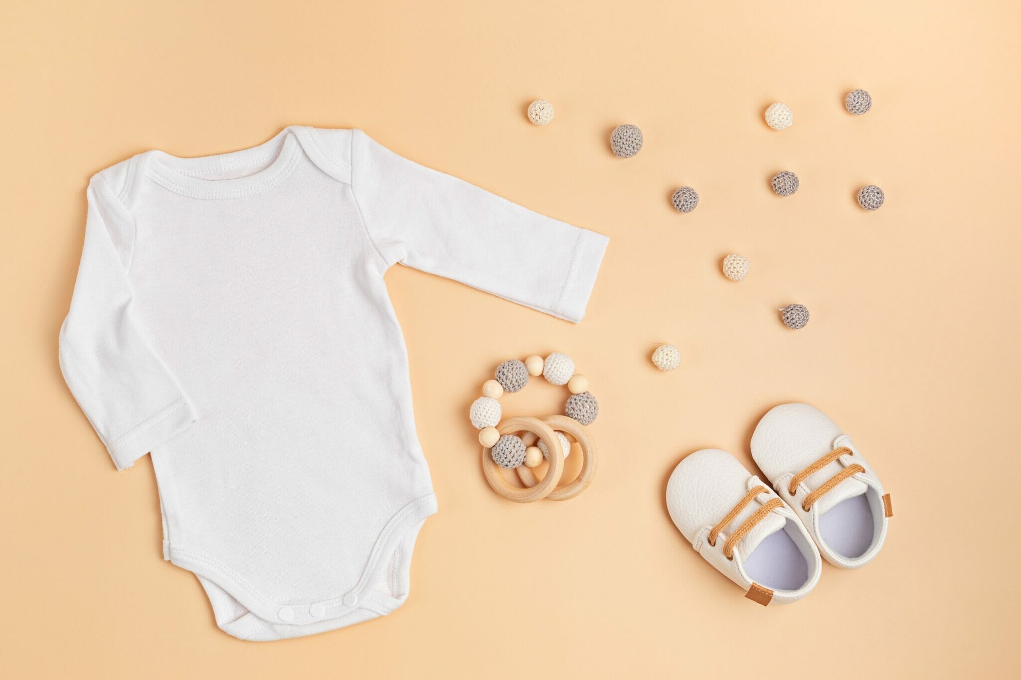 Mockup,Of,White,Infant,Bodysuit,Made,Of,Organic,Cotton,With
