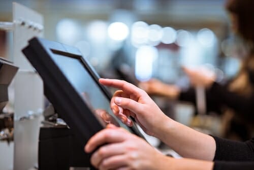 Young,Woman,Hand,Doing,Process,Payment,On,A,Touchscreen,Cash